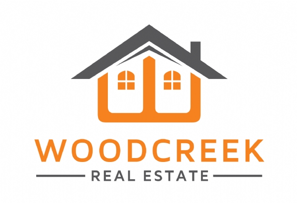 Woodcreek Real Estate - Logo